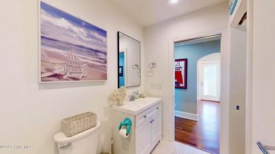 Experience elevated coastal living on highly sought-after