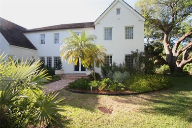 Charming waterfront living in South Coral Gables. Canal front
