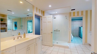 Experience elevated coastal living on highly sought-after