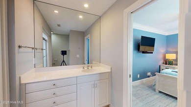 Experience elevated coastal living on highly sought-after