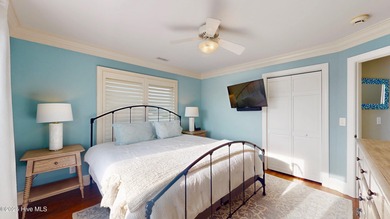 Experience elevated coastal living on highly sought-after