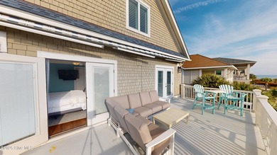 Experience elevated coastal living on highly sought-after