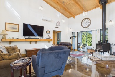 Escape to this 3BR/2BA country retreat on 12.9 acres m/l in