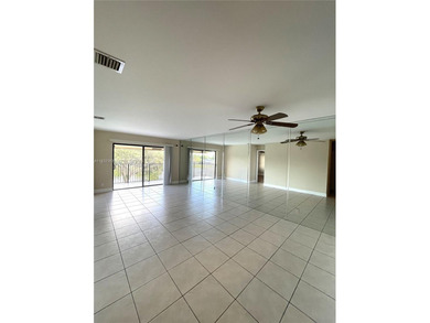 MOVE IN READY,  2BD/2BA TOP FLOOR with a peaceful Lake and