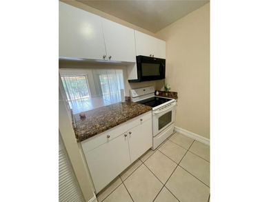 MOVE IN READY,  2BD/2BA TOP FLOOR with a peaceful Lake and
