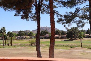 Enjoy expansive views of Stone Creek golf course and Phoenix's