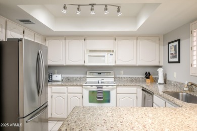 Enjoy expansive views of Stone Creek golf course and Phoenix's