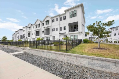 Exceptional end-unit townhome in Emerald Landing at Waterside