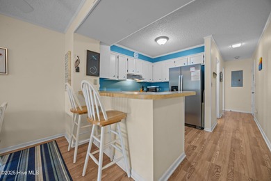 This oceanfront, 1st floor condo is priced just over tax