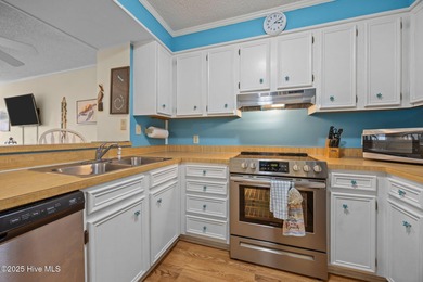 This oceanfront, 1st floor condo is priced just over tax