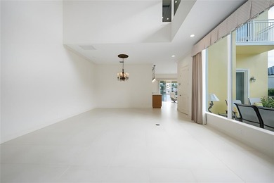 This stunning 3- bedroom,3- bathroom home plus office/den is