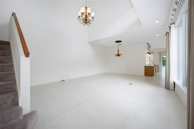 This stunning 3- bedroom,3- bathroom home plus office/den is