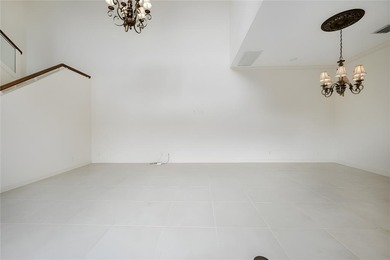 This stunning 3- bedroom,3- bathroom home plus office/den is