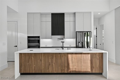 This stunning NEW CONSTRUCTION home is the epitome of modern