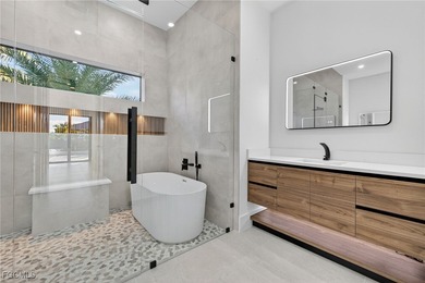 This stunning NEW CONSTRUCTION home is the epitome of modern