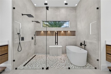 This stunning NEW CONSTRUCTION home is the epitome of modern