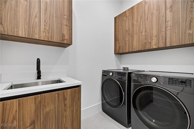 This stunning NEW CONSTRUCTION home is the epitome of modern