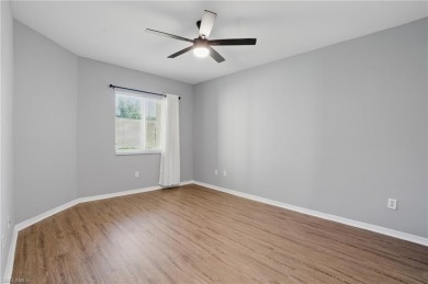 Spacious First-Floor Condo with Lake & Golf Course Views in The