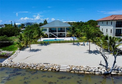 Nestled on the exclusive, gated island of Sunrise Isles in