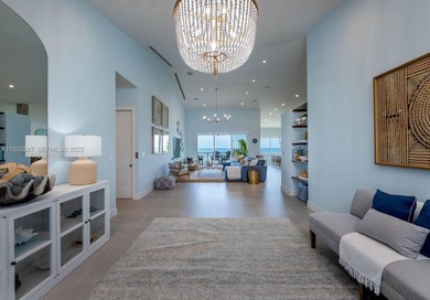 Nestled on the exclusive, gated island of Sunrise Isles in