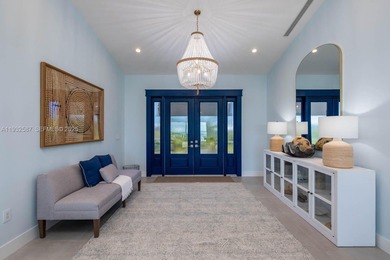 Nestled on the exclusive, gated island of Sunrise Isles in