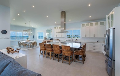 Nestled on the exclusive, gated island of Sunrise Isles in