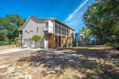 Rare opportunity on Oak Island. Step into the ultimate coastal