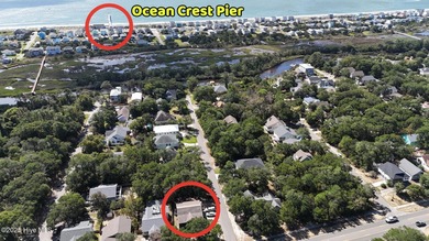 Rare opportunity on Oak Island. Step into the ultimate coastal