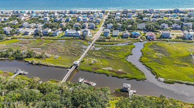 Rare opportunity on Oak Island. Step into the ultimate coastal