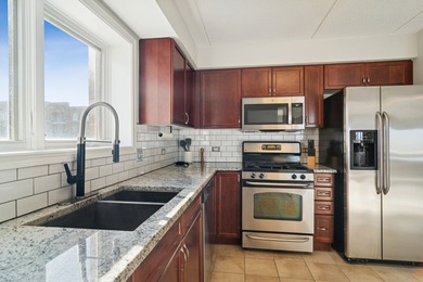 Rarely available corner unit with peaceful courtyard views and