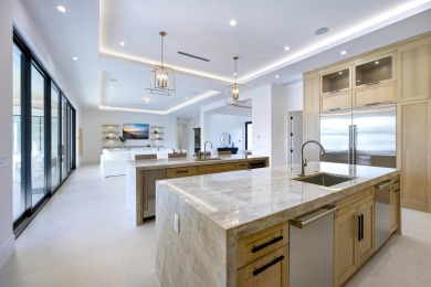 This extraordinary new-construction waterfront estate offers a