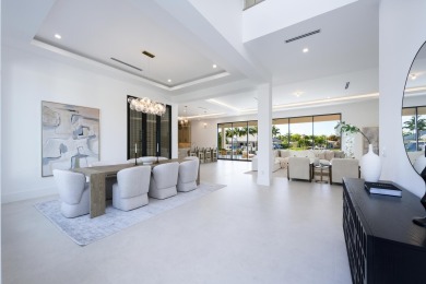 This extraordinary new-construction waterfront estate offers a