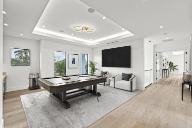 This extraordinary new-construction waterfront estate offers a