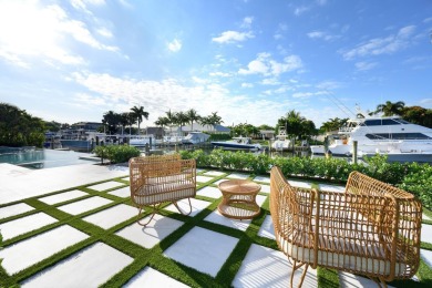 This extraordinary new-construction waterfront estate offers a