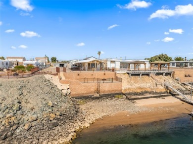 Enjoy RIVERFRONT LIVING and your own private paradise at your