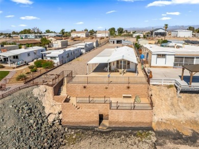 Enjoy RIVERFRONT LIVING and your own private paradise at your