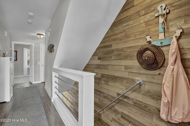 303 Vesta Court offers an exceptional coastal living experience