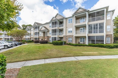 Top-floor, end-unit condo in the desirable Woodlands at Crow
