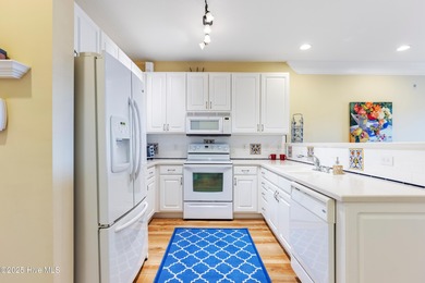 Top-floor, end-unit condo in the desirable Woodlands at Crow