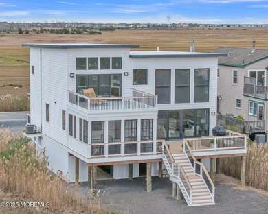 Experience the best of luxury waterfront living in this stunning