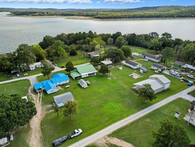 Discover your .48 ac m/l lakefront retreat in Indian Meadows