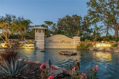 WATERFRONT LIVING IN A BOATING COMMUNITY.  Experience the
