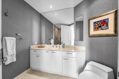 Spectacular 3-bedroom, 5-bath residence in the highly