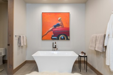 Stunning second floor luxury condominium in the heart of