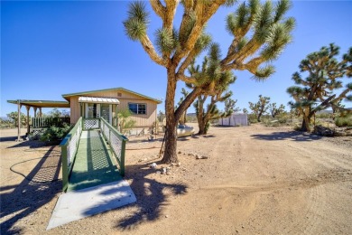 Welcome to 18852 N Spur Dr located in Lake Mohave Ranchos of