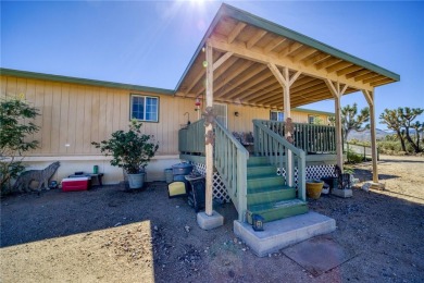 Welcome to 18852 N Spur Dr located in Lake Mohave Ranchos of