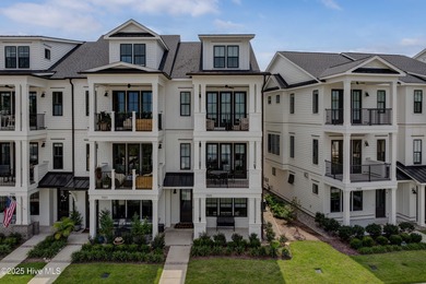 This luxurious townhome in Riverlights Marina Village was built
