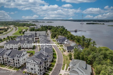 This luxurious townhome in Riverlights Marina Village was built