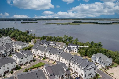 This luxurious townhome in Riverlights Marina Village was built