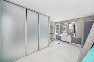 This sophisticated corner condo is an ideal full-time residence